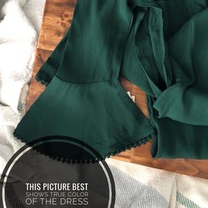 Green bell sleeved mid length dress